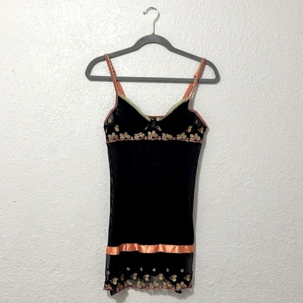 Black babydoll lingerie with butterfly stitching